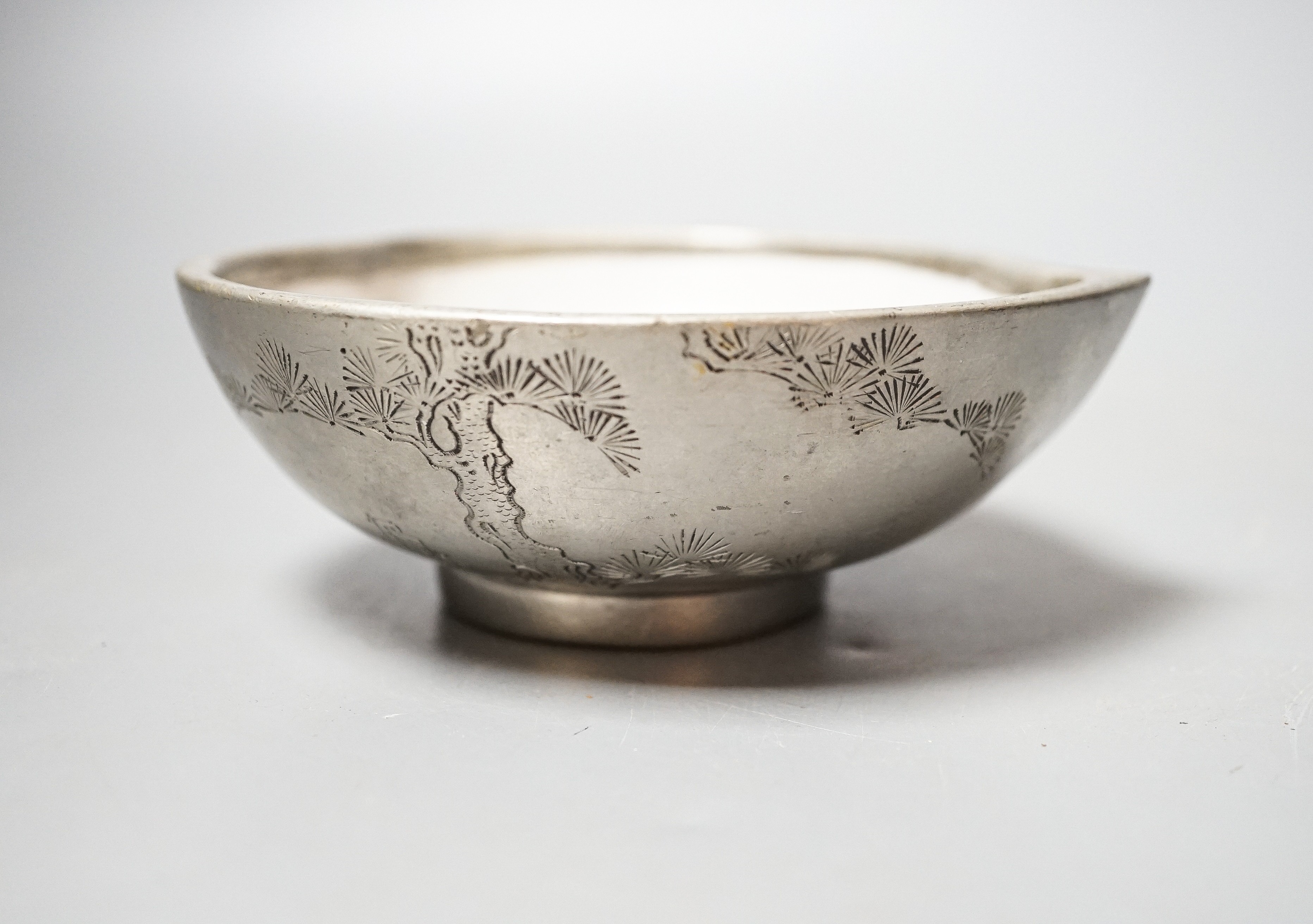A Chinese Yixing pottery and pewter mounted peach shaped cup, late 19th century, length 13cm